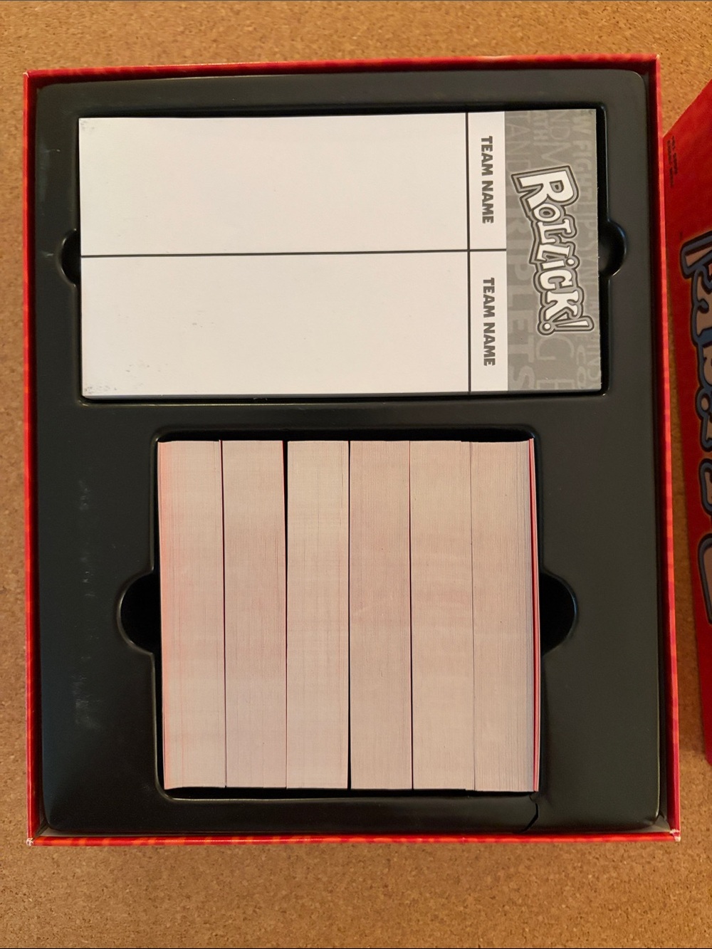 Rollick! Party Game by — Red Box with Blue, Yellow & Green Masks - Picture 5 of 6